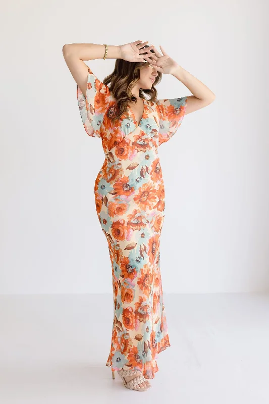 Versatile outfits to transition from day to night Carolina Short Flutter Sleeve Floral Print Maxi Dress Orange Versatile outfits to transition from day to night Carolina Short Flutter Sleeve Floral Print Maxi Dress Orange