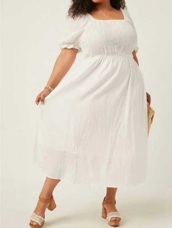 Sporty-chic women’s apparel for active lifestyles   Classic Summer Midi Dress In White
