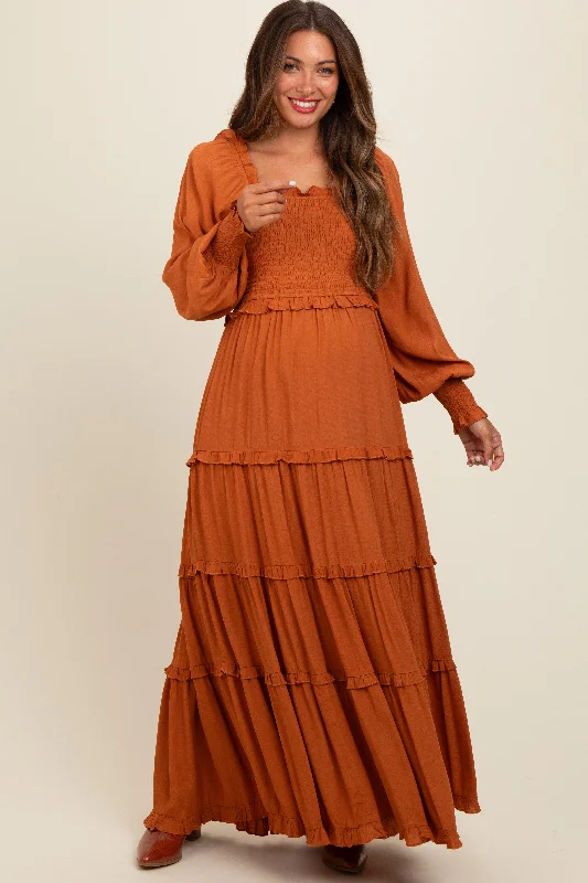 Curated collections for modern, fashionable women Camel Smocked Long Sleeve Ruffle Tiered Maternity Maxi Dress Curated collections for modern, fashionable women Camel Smocked Long Sleeve Ruffle Tiered Maternity Maxi Dress